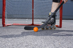 inline hockey player and equipment