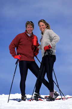 two skiers